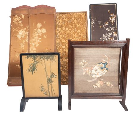 An Edwardian oak firescreen with Japanese silkwork panel of a tied egg and blossoming flowers, 81cm wide, also a Japanese bla