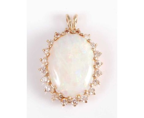 A yellow metal, opal and diamond cluster pendant, the oval cabochon cut opal measuring approx 18.4 x 13.1 x 3.0mm, weight est