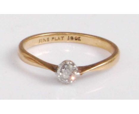 An 18ct gold diamond solitaire ring, the claw set old round cut diamond weighing approx 0.24 carats, 2.7g, size Q