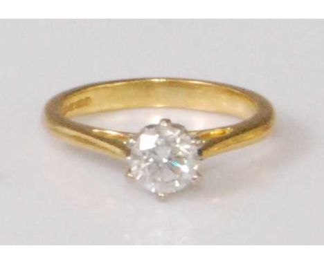 An 18ct gold diamond solitaire ring, the six claw set brilliant weighing approx 0.65 carats, 4g, size KCondition report: Diam