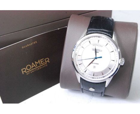 A gent's Roamer Superior steel day-date quartz wristwatch, having a signed engine turned dial, baton markers, and Arabic oute