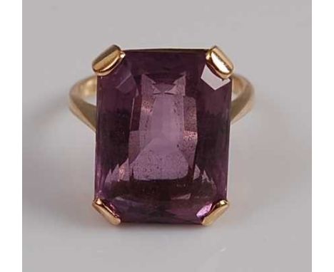 A 9ct yellow gold amethyst dress ring, the octagonal amethyst measuring approx 17.6 x 13.0 x 8.89mm, estimated as weighing 15