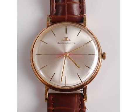A Gents Jaegar LeCoultre 9ct gold manual wind wristwatch, having round silvered baton dial and signed movement numbered 16894