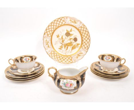 Noritake - A set of porcelain china Noritake jewelled gilt items comprising of two teacups and saucers, milk jug and small ca