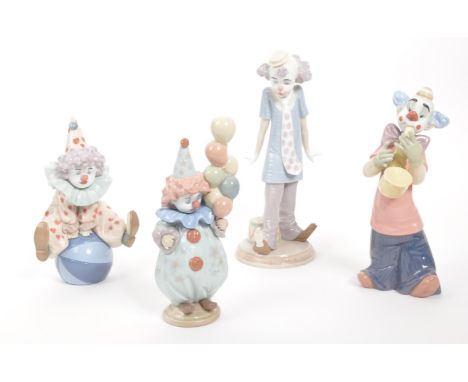 Lladro &amp; Nao - A collection of four vintage 20th century Spanish porcelain clown figurines to include Lladro 5812, Lladro