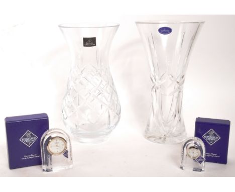 A collection of assorted crystal glassware comprising x2 Royal Doulton cut glass vases, one of trumpet form, the other urn sh