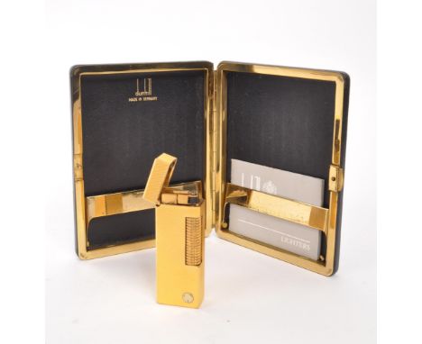 Dunhill - A mid 20th century Dunhill lighter and cigarette case. The lighter having gold tone engine turned finish, with hing