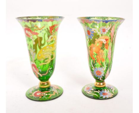 A pair of bohemian 20th Century vintage green glass and enamel vases each having floral animal designs with gilt detailing.17