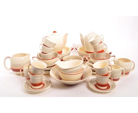 Susie Cooper - An early 20th Century circa 1930s Art Deco ceramic coffee service and dinner service in the Wedding Band patte