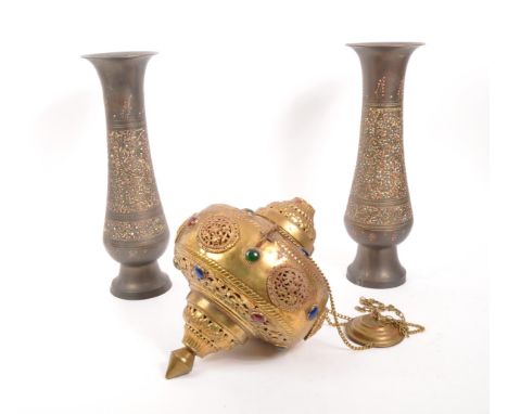 A pair of 20th century benares vases alongside a brass cabochon set lantern. The vases having engraved floral designs with do