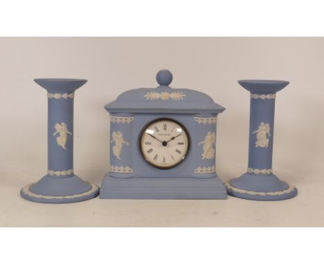 Wedgwood Bicentenary dancing hours clock with matching candlestick . Both with certificates. Height of clock 16cm 