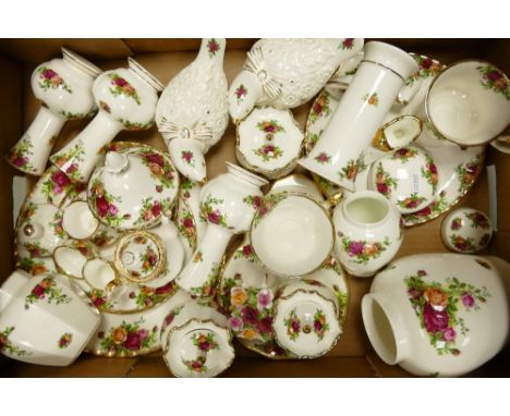 A collection of Royal Albert Old Country Roses to include ginger jars, bud vases, lidded trinket dishes, cake stand (no metal