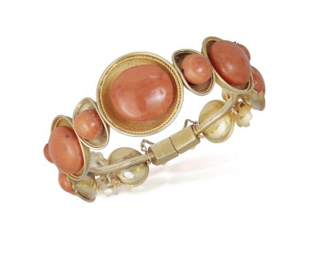 A CORAL DEMI PARURE AND A NECKLACEComprising: a hinged bangle, a brooch, a pair of ear clips and a ring, designed as circular