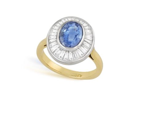 A SAPPHIRE AND DIAMOND RING Set with an oval-shaped sapphire weighing approximately 2.30cts, within a tapered baguette-cut su