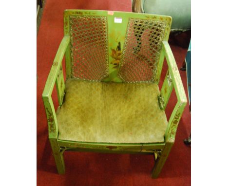 An unusual early 20th century green lacquered chinoiserie cane back childs armchair, in the Chinese Chippendale taste, w.52cm