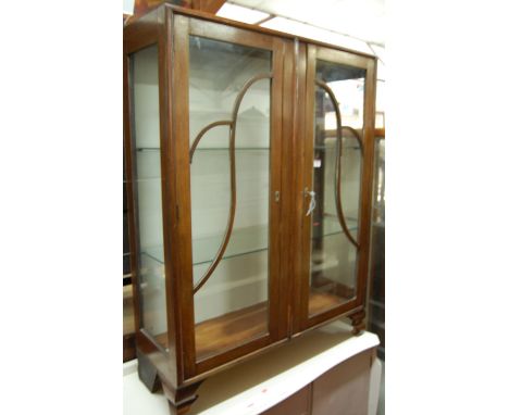 A 1930s oak double door glazed china display cabinet, w.88cm