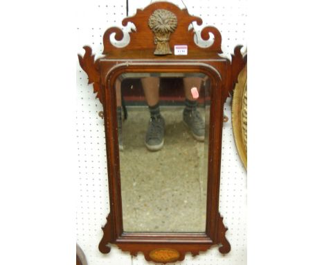 An early 20th century Chippendale style mahogany fret carved bevelled wall mirror, 80 x 42cm