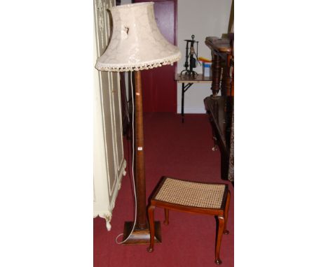 An Art Deco standard lamp, together with a cane top dressing stool (2)