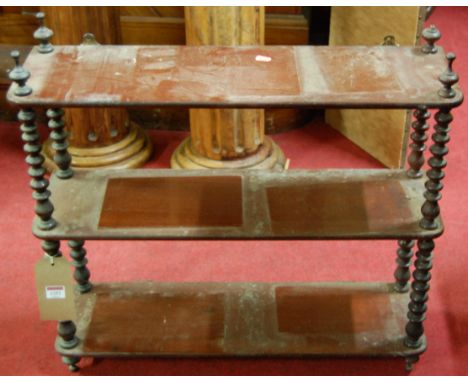 A 19th century mahogany and bobbin turned three-tier hanging wall shelf, width 68cm