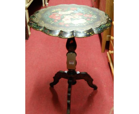 A papier-mache shaped top pedestal tripod occasional table, floral decorated and heightened in gilt, dia. 51.5cm