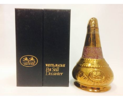 WHYTE & MACKAY 12 YEARS OLD POT STILL DECANTER
Blended Scotch Whisky
Full size bottle, no capacity or strength stated. Presen