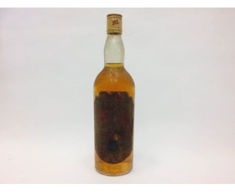 BULLOCH LADE'S EXTRA SPECIAL GOLD LABEL
Blended Scotch Whisky
Believed to be bottled circa 1970s. 26 2/3 fl. oz. 70° proof.  