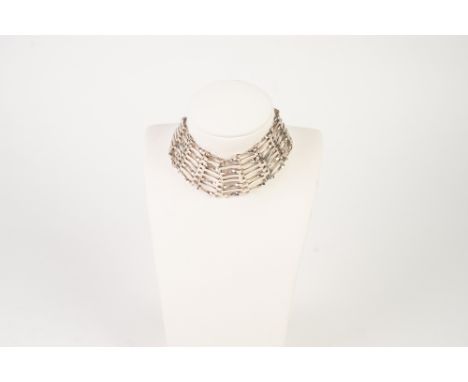 SILVER BROAD GATE PATTERN BRACELET, eight bar pattern with padlock clasp, Brimingham 1980 