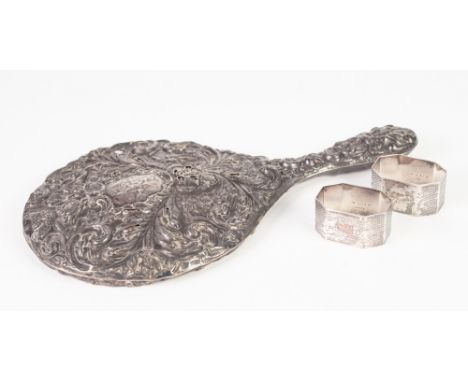 AN EARLY TWENTIETH CENTURY SILVER BACKED HAND MIRROR, with stamped all over pattern of foliate scrollwork, also a  PAIR OF EN