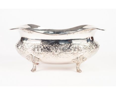 ITALIAN SILVER COLOURED METAL (925) mark, RAISED OVAL BOWL, with plain broad wavy open lip top, the bombe sides repousse with