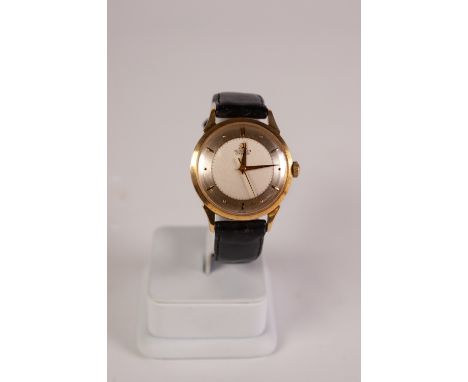 A PROBABLY 18K GOLD (the back plate not removed) GENTLEMAN'S GUBELIN IPSO-MATIC WRIST WATCH, with sweep seconds hand, on leat