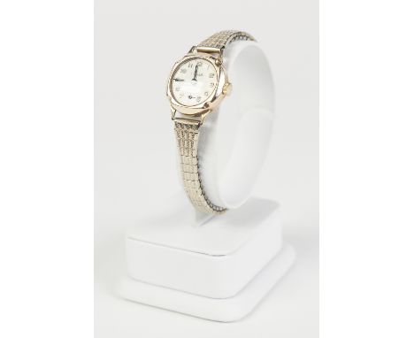 9ct GOLD CASED ARISTO LADY'S WRIST WATCH, on replaced expandable metal bracelet 