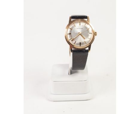9ct GOLD CASED GARRARD GENTLEMAN'S WRIST WATCH, with sweep seconds hand and baton numerals, on Condor Lizard calf strap, in c