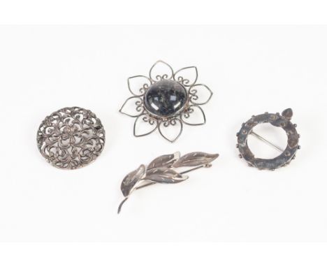 SCOTTISH SILVER OPENWORK FLOWER BROOCH, set with a large circular cabochon hardstone, 2" diameter, Edinburgh 1987, makers mar