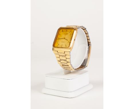 GENTS TISSOT '125' QUARTZ WRIST WATCH, the rectangular gold coloured dial with batons, gold plated case and integral gold pla