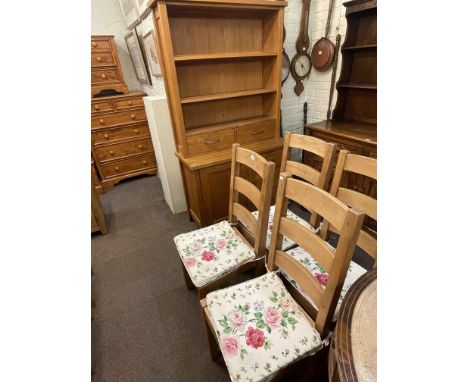 Modern oak shelf back dresser and set of four beech bar back kitchen chairs.