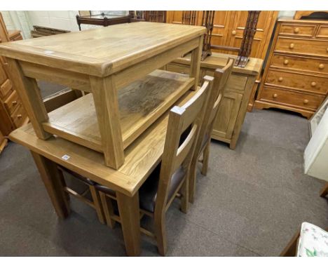 Light oak eight piece suite comprising three door sideboard, extending dining table, four dining chairs, coffee table and ent