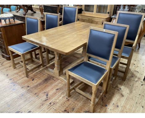 Robert Thompson of Kilburn 'Mouseman' rectangular adzed cut dining table and six studded hide chairs including pair carvers (