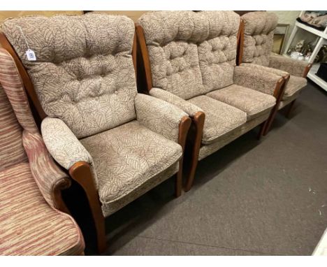 Three piece cottage suite in light brown buttoned fabric.