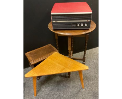 A Vintage Bush RP60 turntable record player, red leatherette case;  an E. Gomme G-Plan corner occasional table, pale oak;  et