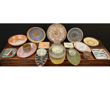 Studio pottery - V M Joy, a large oval dish, marbled glaze, 49.5cm x 25cm;  a graduated set of three stoneware dishes, larges