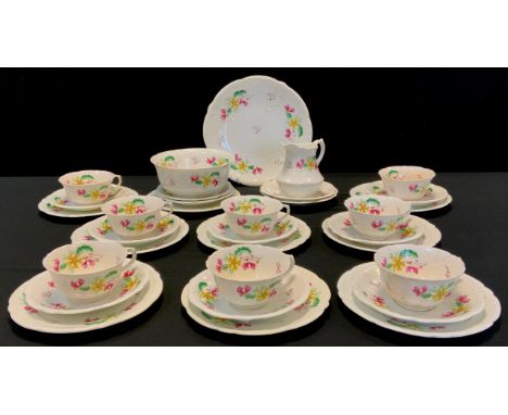 An 19th century Aynsley tea set for eight, hand painted with pink and yellow flowers including; eight tea cups and saucers, e