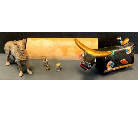 A Japanese bamboo scribes wrist rest, with traditional hunchbacked figures;  cast metal pendant Monkey of Horse back etc;  ar