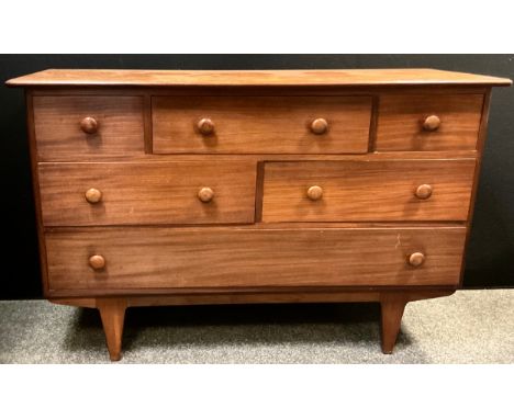 Mid century design - A Younger Furniture wide chest of drawers / sideboard, Mandeville Afrormosia model, the over-sailing rou