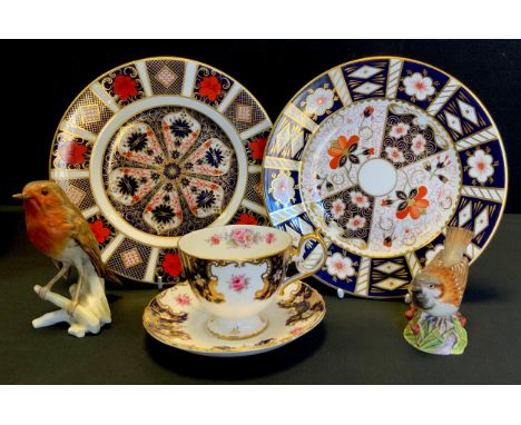 A Royal Crown Derby 1128 pattern dinner plate, another dinner plate, 2451 pattern;  a Goebel Robin; etc 