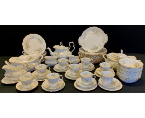 A Royal Albert pattern ‘Haworth’ part table service comprised of; a tea pot nine tea tea cups and saucers, milk jug and sugar