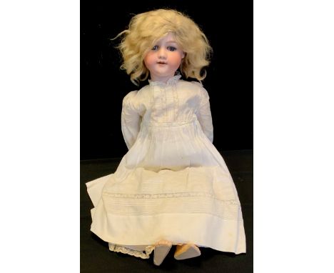 A large German Armand Marseille socket doll,  mould 390, with jointed composition body, blonde hair, blue sleeping eyes, dres