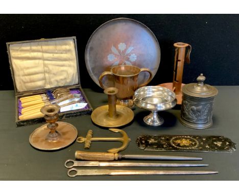A Hugh Wallis Arts and Crafts inlaid copper salver ;  multi level copper chamberstick;  pewter tea caddy etc. 
