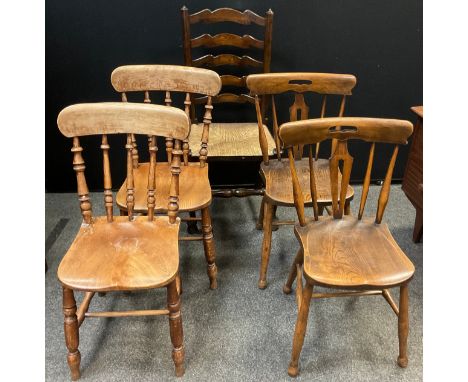 A pair of Arts and Crafts Elm and Beechwood chairs;  and a pair of 19th century elm spindle back kitchen chairs; an 18th cent