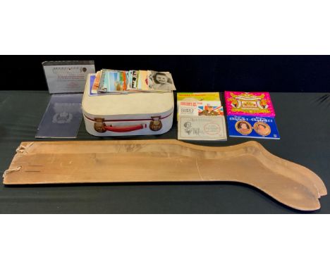 Three wooden sock formers, vintage case, cigarette cards, postcards etc 