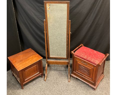 A Victorian walnut piano seat, tilting door to front with sheet music rack, carved door panel, bracket feet, 55.5cm high x 55